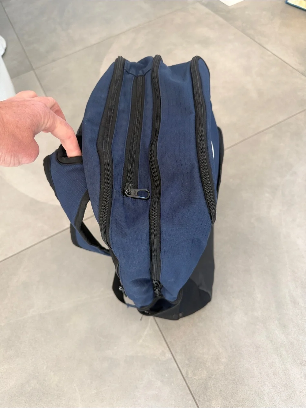 Nike Blue and Black Sports Backpack with White Swoosh